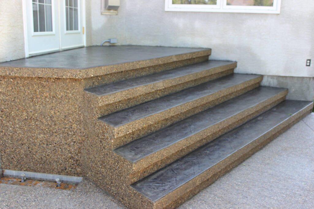 exposed aggregate stairs up to the back double doors